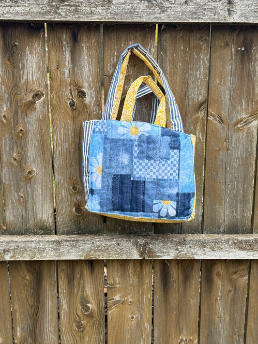 Denim pattern and yellow handbag